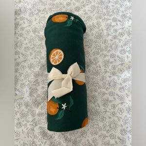 Kyte baby Oranges swaddle blanket